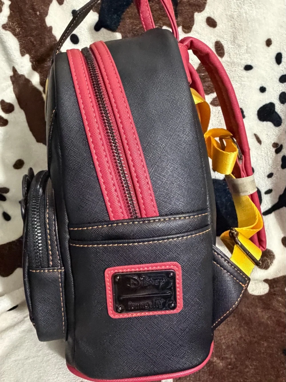 Loungefly Black Mini Backpack with Pink Trim and Yellow Stitching